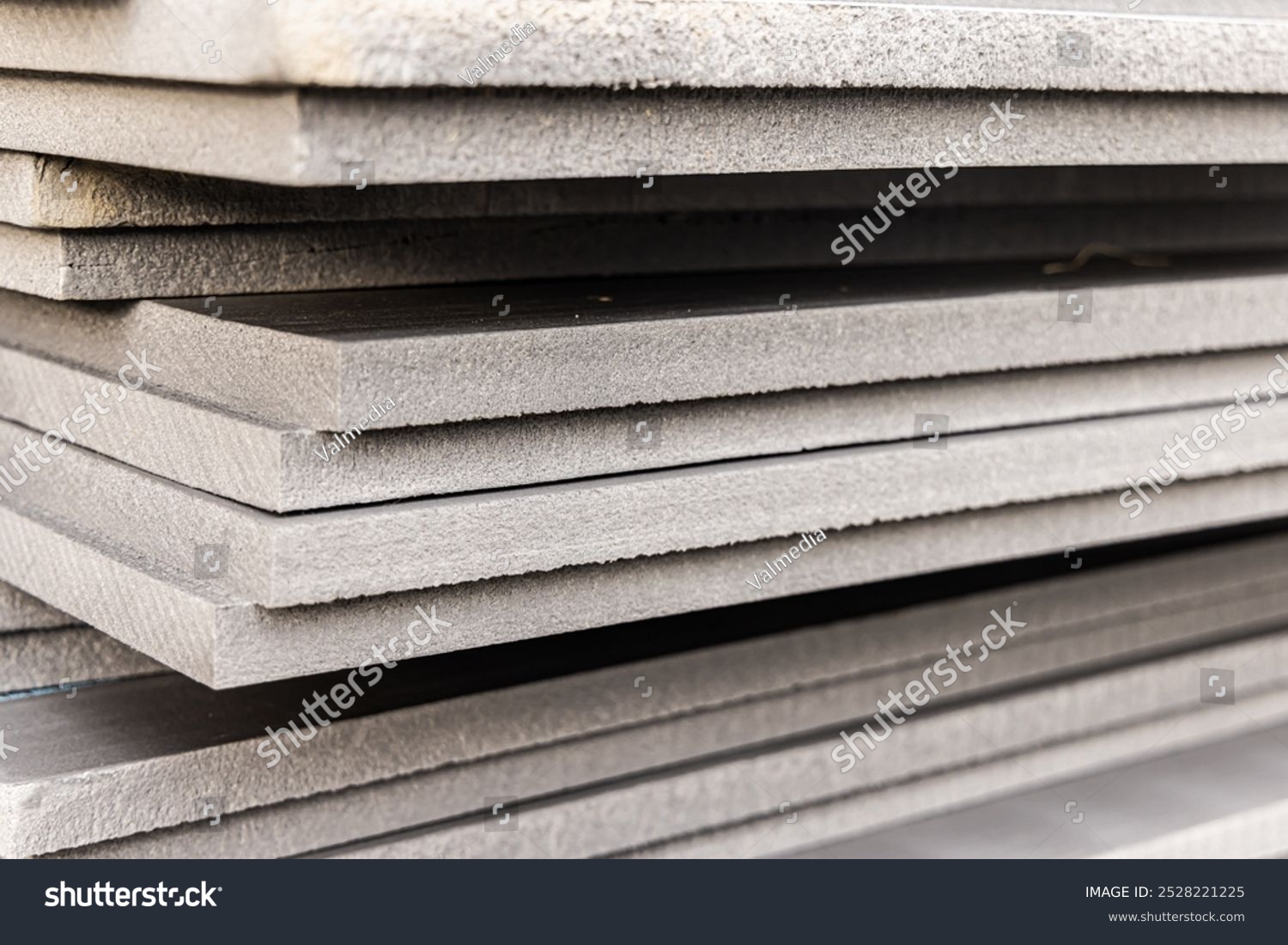 stock-photo-many-sheets-of-rigid-xps-extruded-polystyrene-insulation-boards-are-stacked-and-ready-for-use-at-a-2528221225